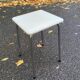 Vintage square stool in steel and white leather