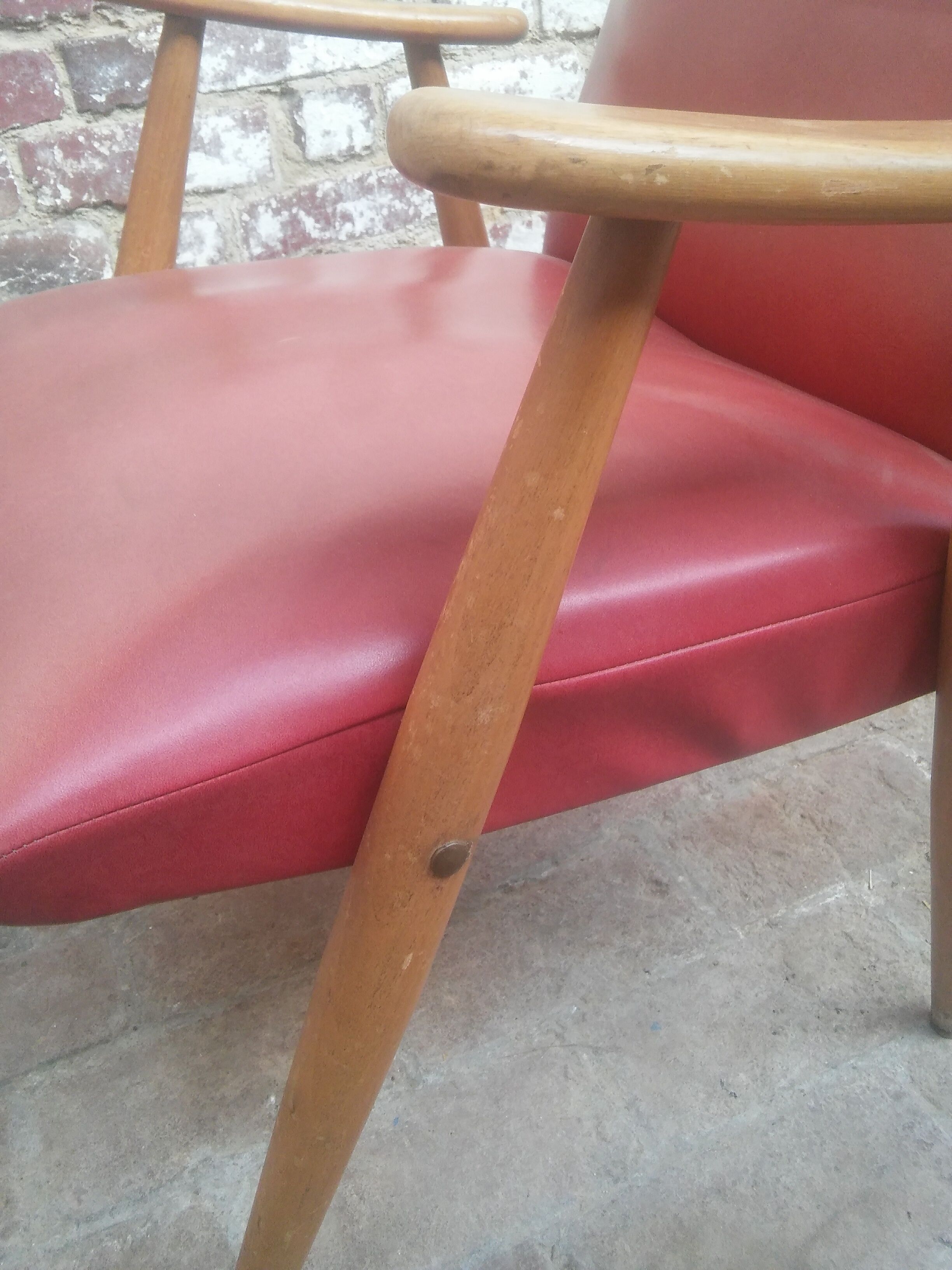 Red armchair with compass feet 50s