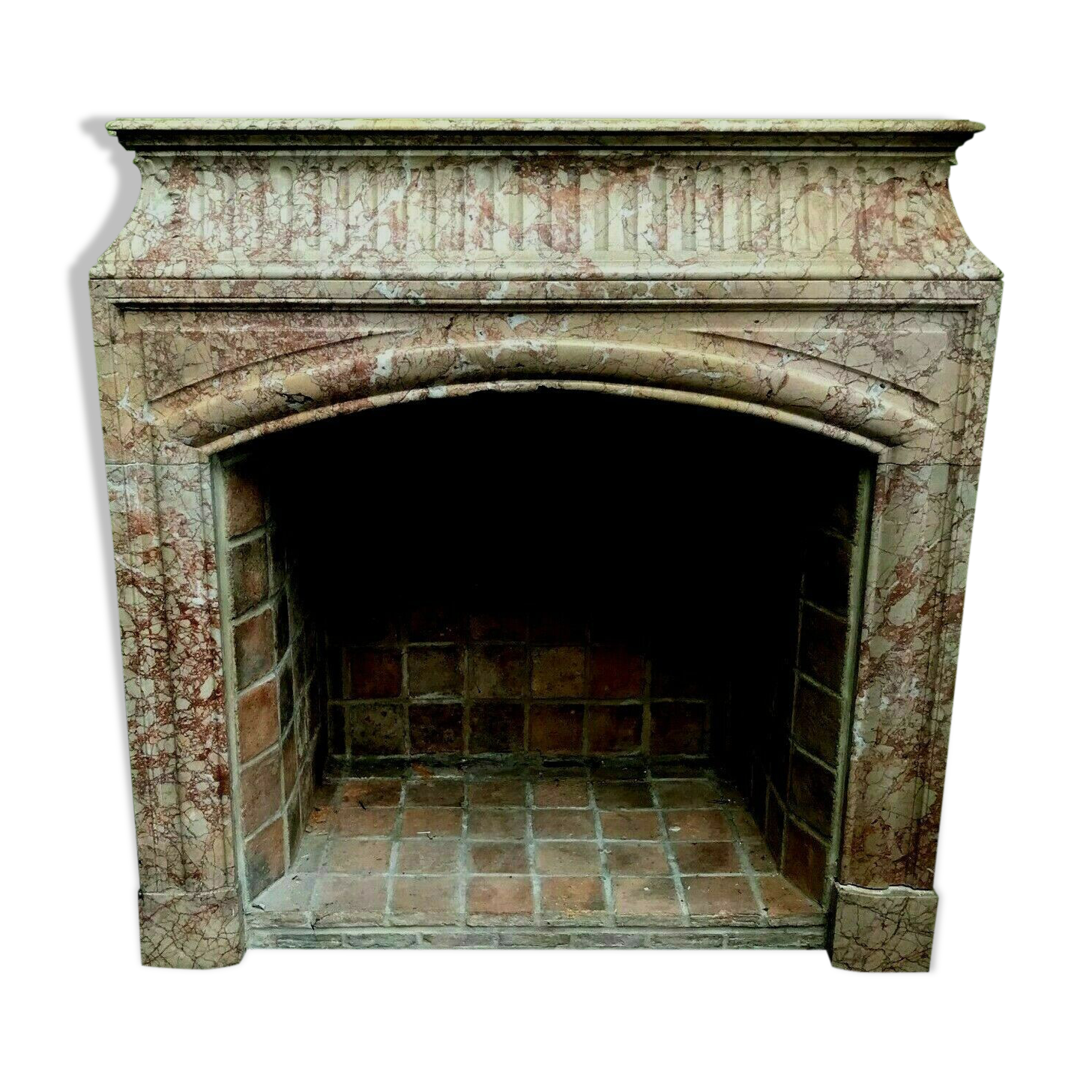 Louis XIV-style fireplace has 19th century veined pink marble hood