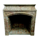 Louis XIV-style fireplace has 19th century veined pink marble hood