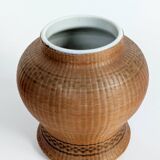 Pair of vintage Chinese vases in porcelain and woven bamboo.