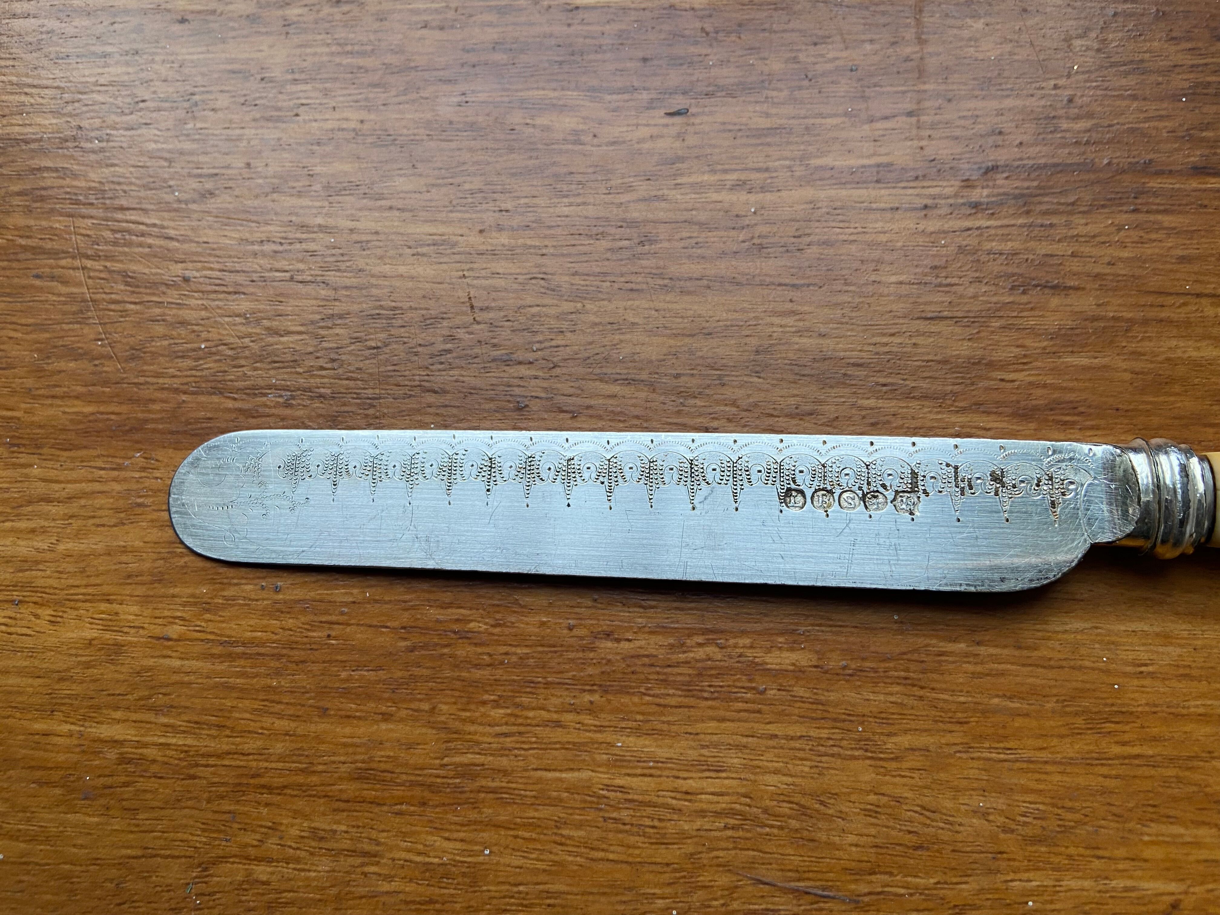 Antique silver-plated butter knife
