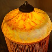 Antique bronze lamp with a marbled yellow glass paste shade, 52x21 cm. Inter a l