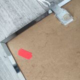 Vintage mirror with silver metal frame to hang