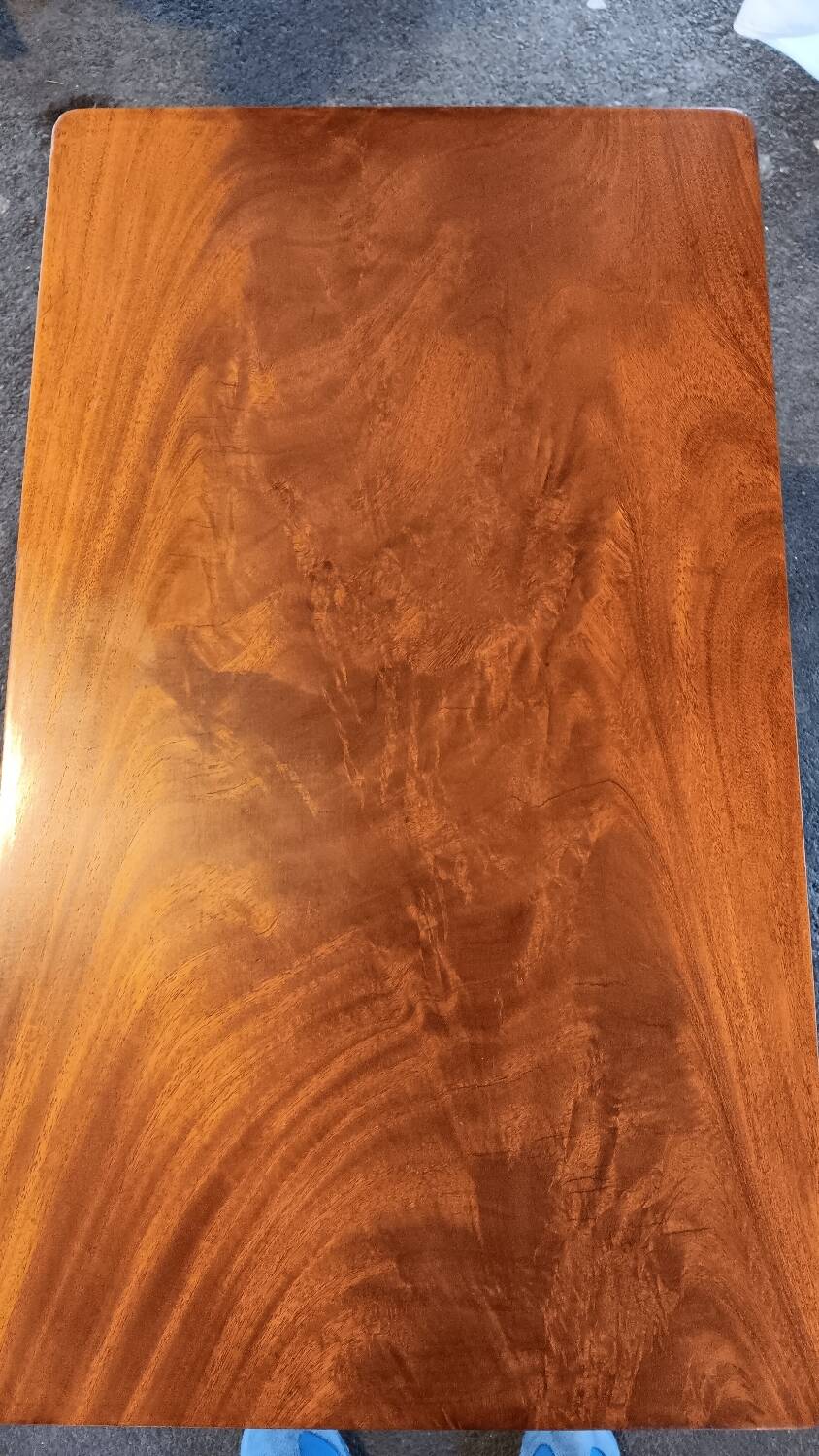 Coffee table / side table in mahogany with a rattan shelf.