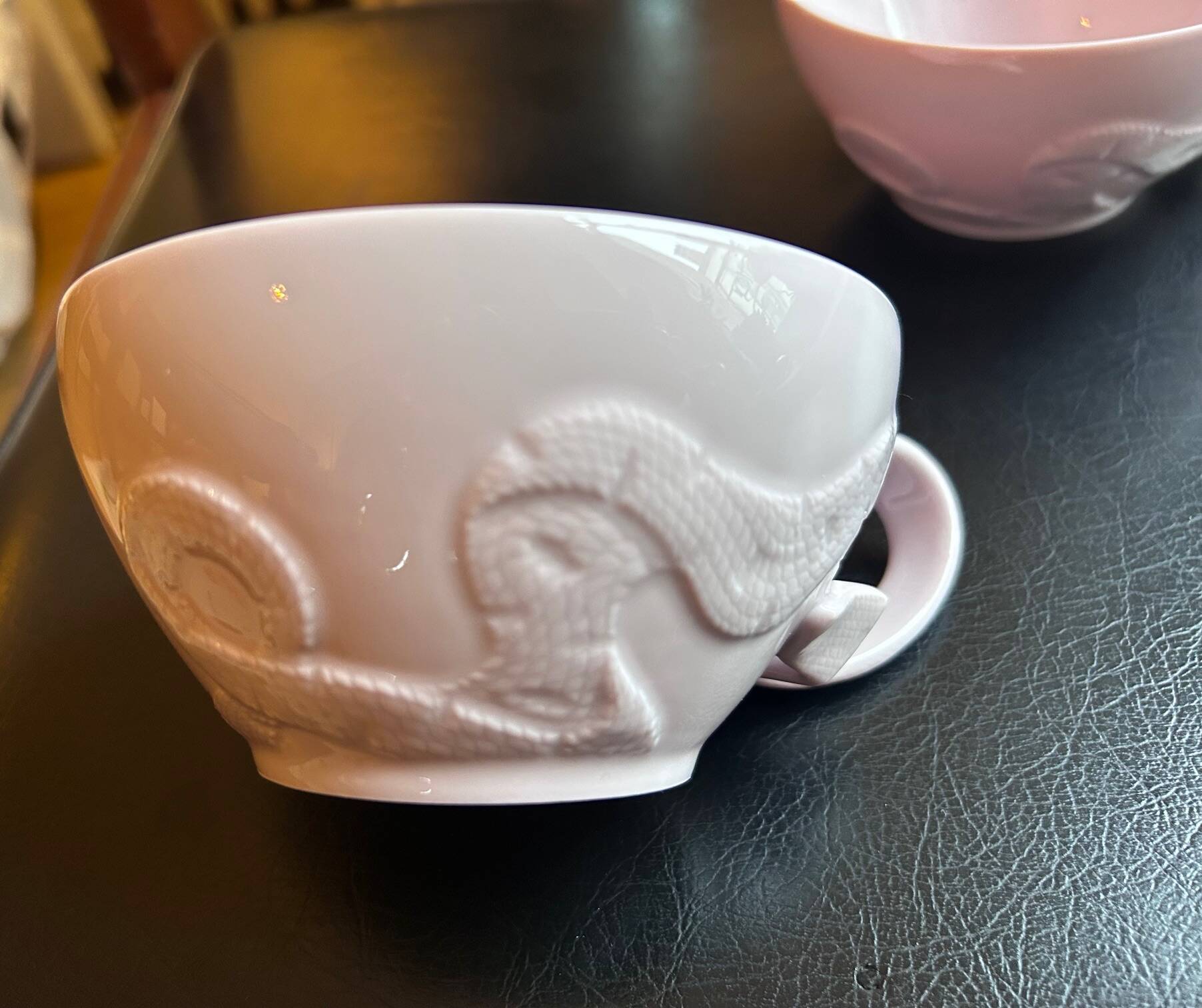 Two pink haviland porcelain teacups