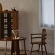Pair of Scandinavian wooden armchairs with hand-carved folk motifs, 1920s.