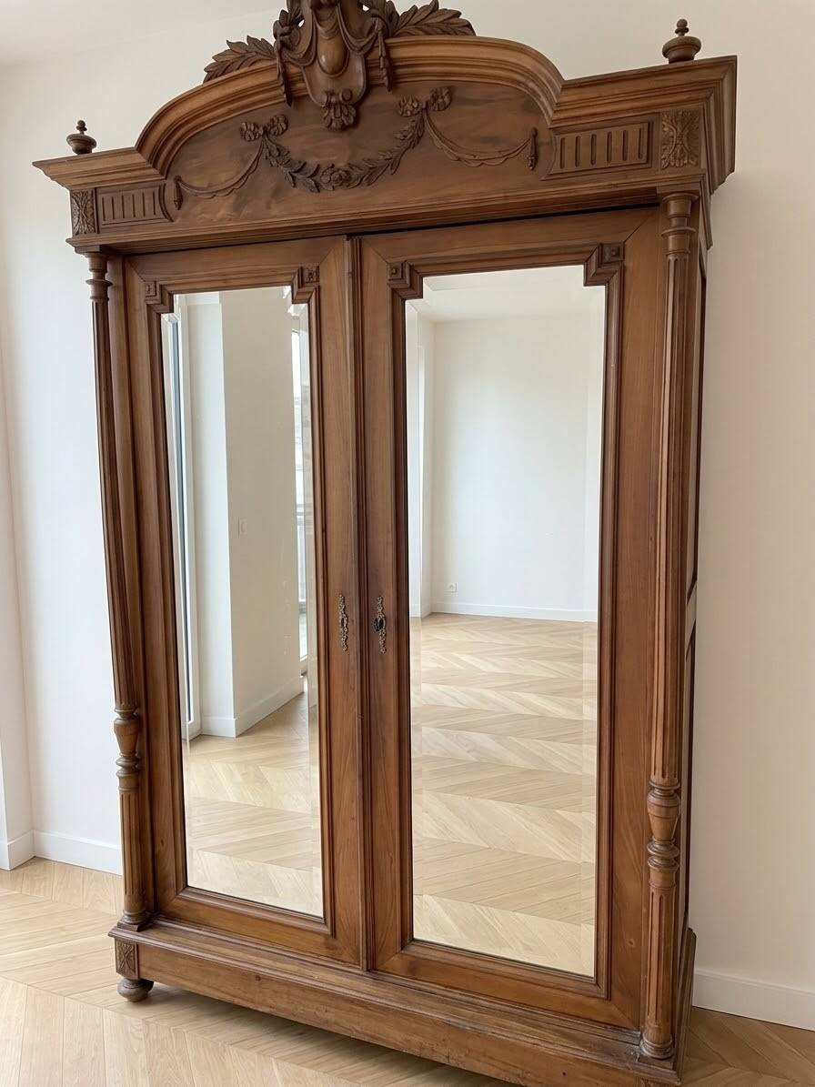Antique solid wood wardrobe with mirror doors.