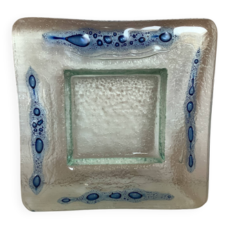 Blue glass paste pocket emptier