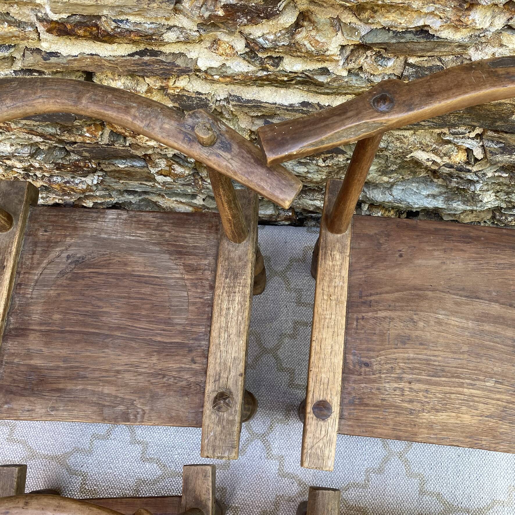 Ancient Baoulé African chairs in carved wood, Wabi-Sabi.