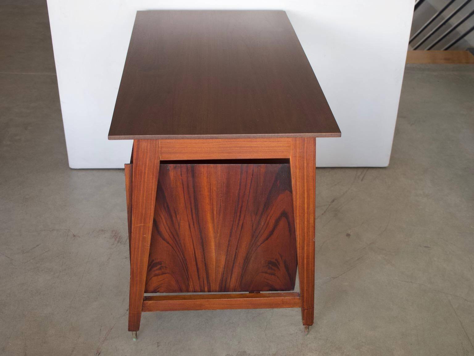 Small Italian wooden desk with brass details.