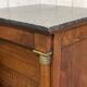 Empire bedside table from the 19th century in cherry wood and black marble.