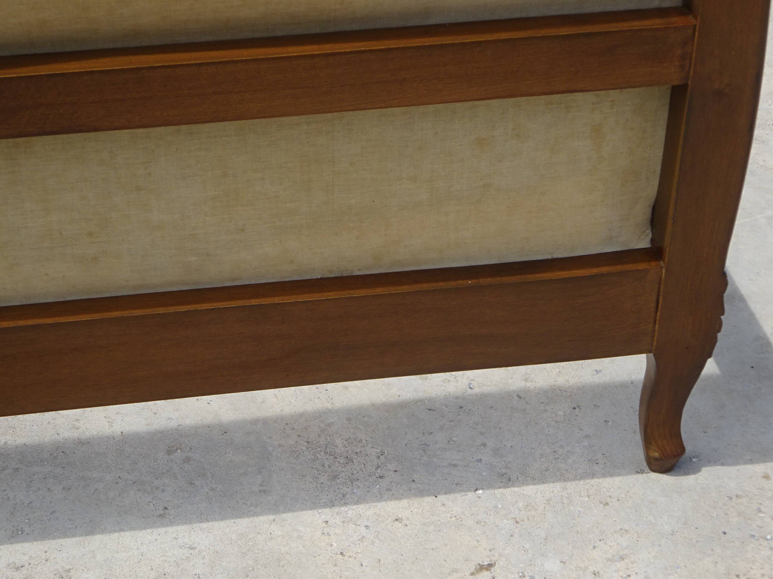 Solid wood bed frame with Jacquard fabric.