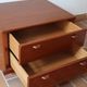 Small piece of furniture with 2 drawers in teak, bedside table or end table.