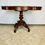 Violin-shaped pedestal table