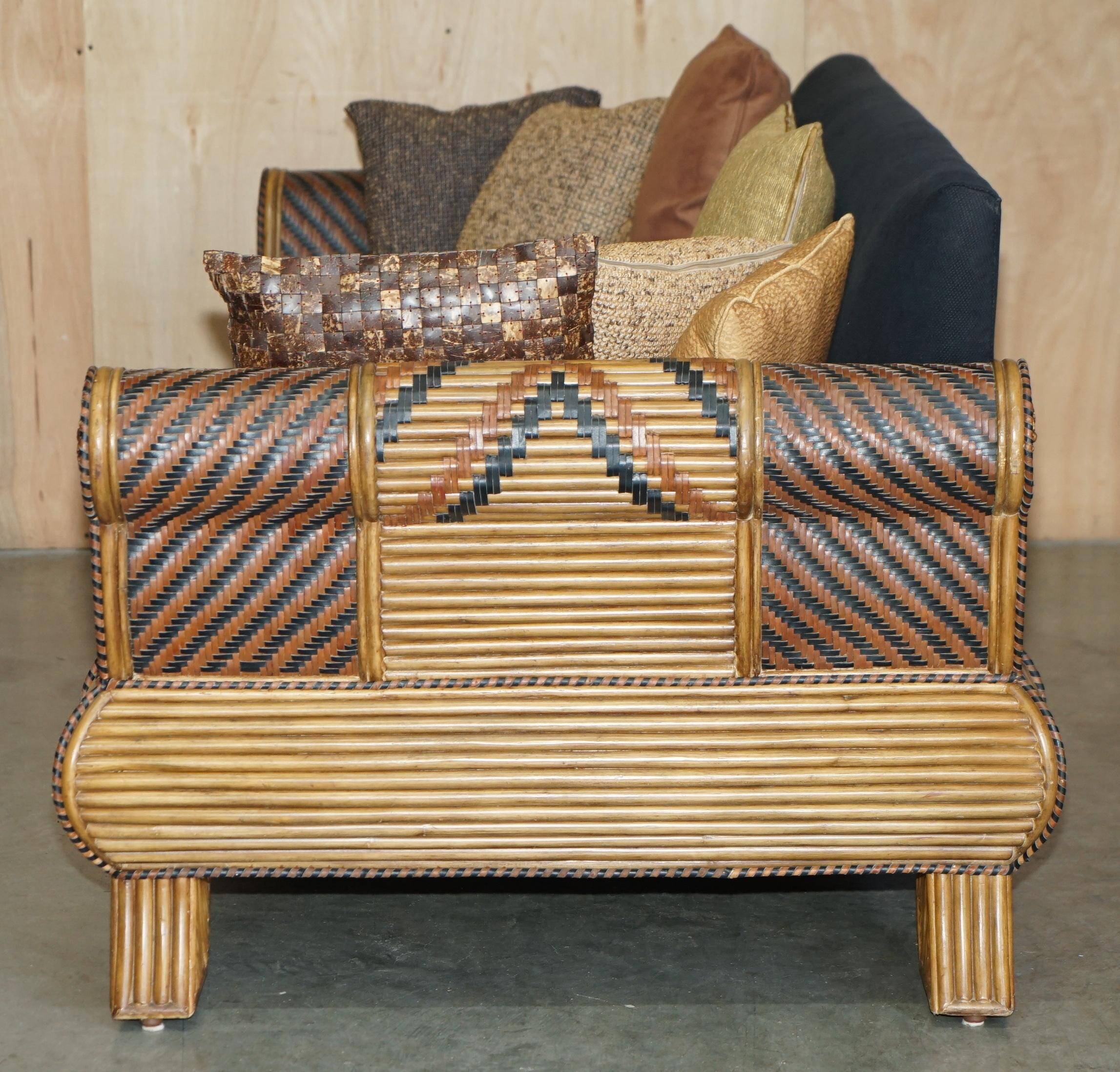 Vintage 1970s canapé with bamboo frame and Aztec patterns.