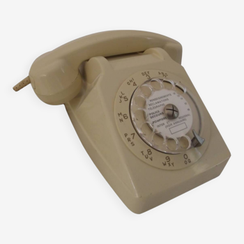 Rotary beige telephone