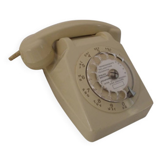 Rotary beige telephone