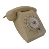 Rotary beige telephone
