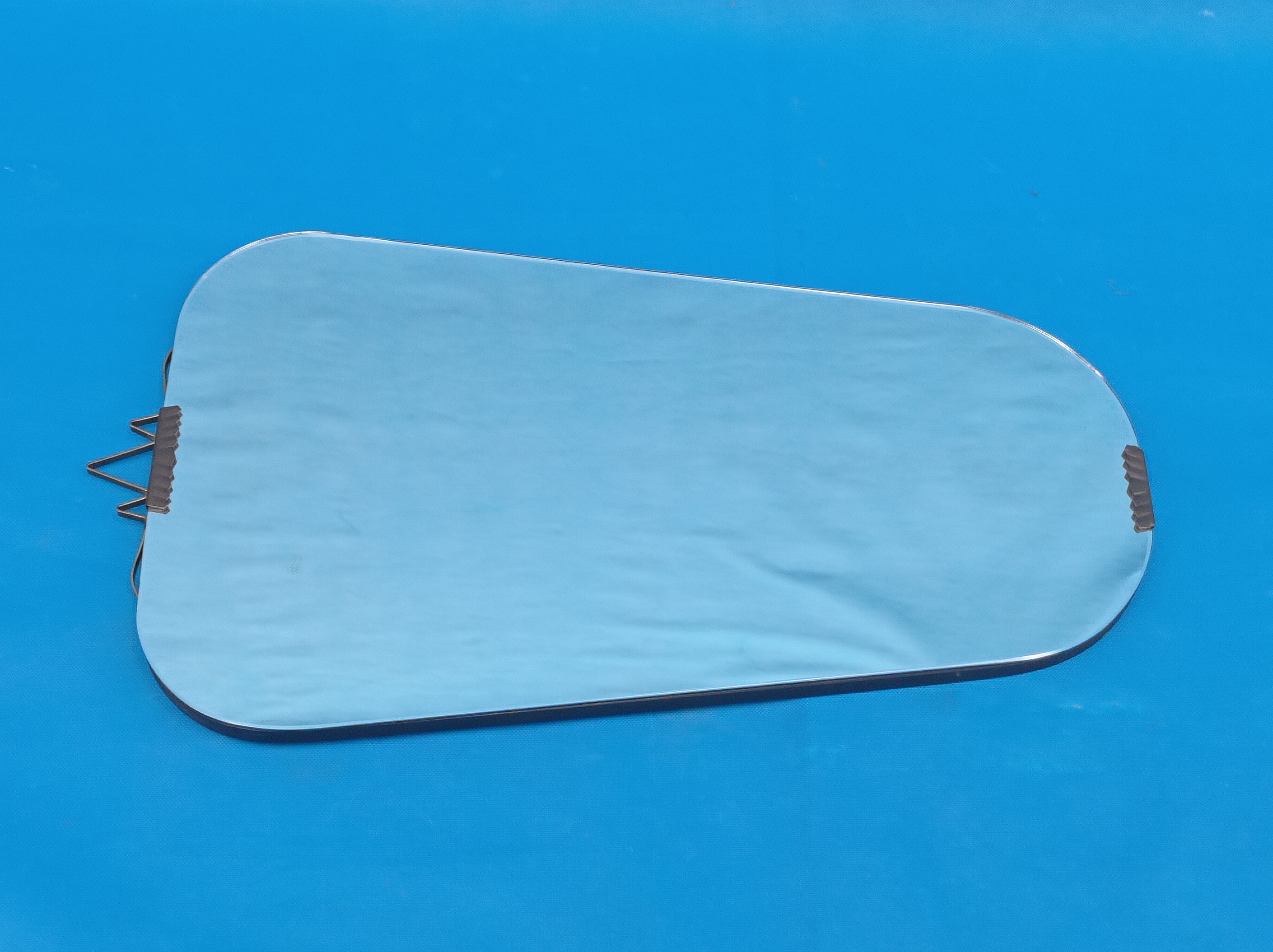 Asymmetrical mirror from the 1960s