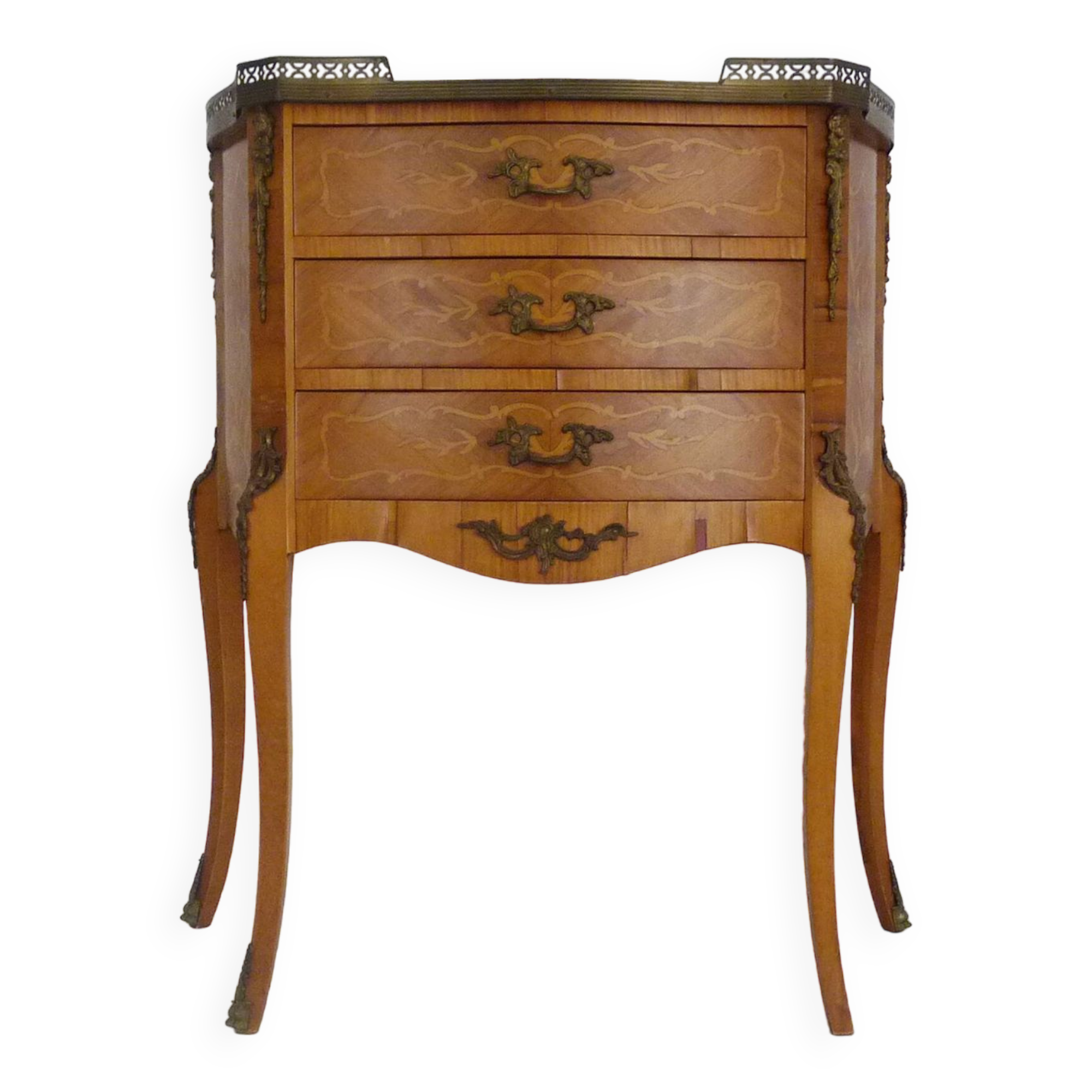 Baroque style wooden chest of drawers with bronze frieze.