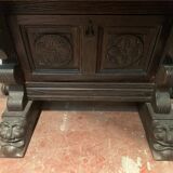 Console table in carved oak XX century