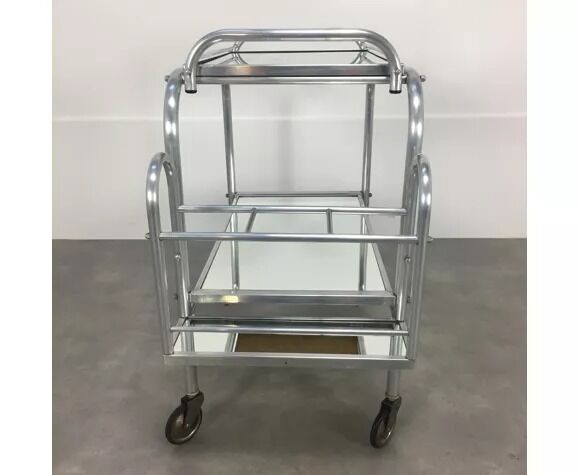 Modernist service mirrors and metal