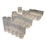Set of 43 signed Daum crater glasses, an ice bucket, an ashtray,