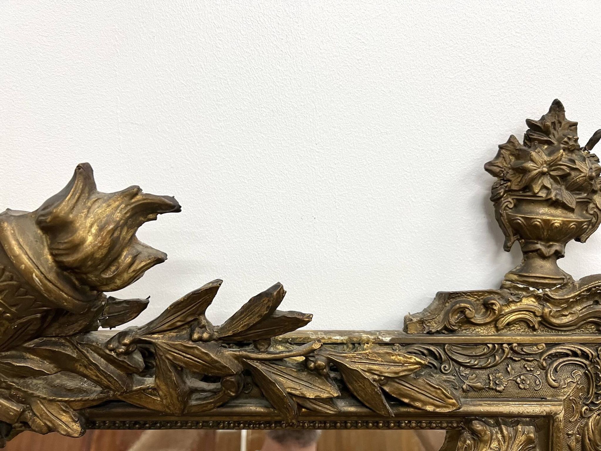 Large antique pediment mirror with mouldings.