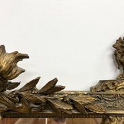 Large antique pediment mirror with mouldings.