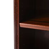 Vintage bookshelf with a door