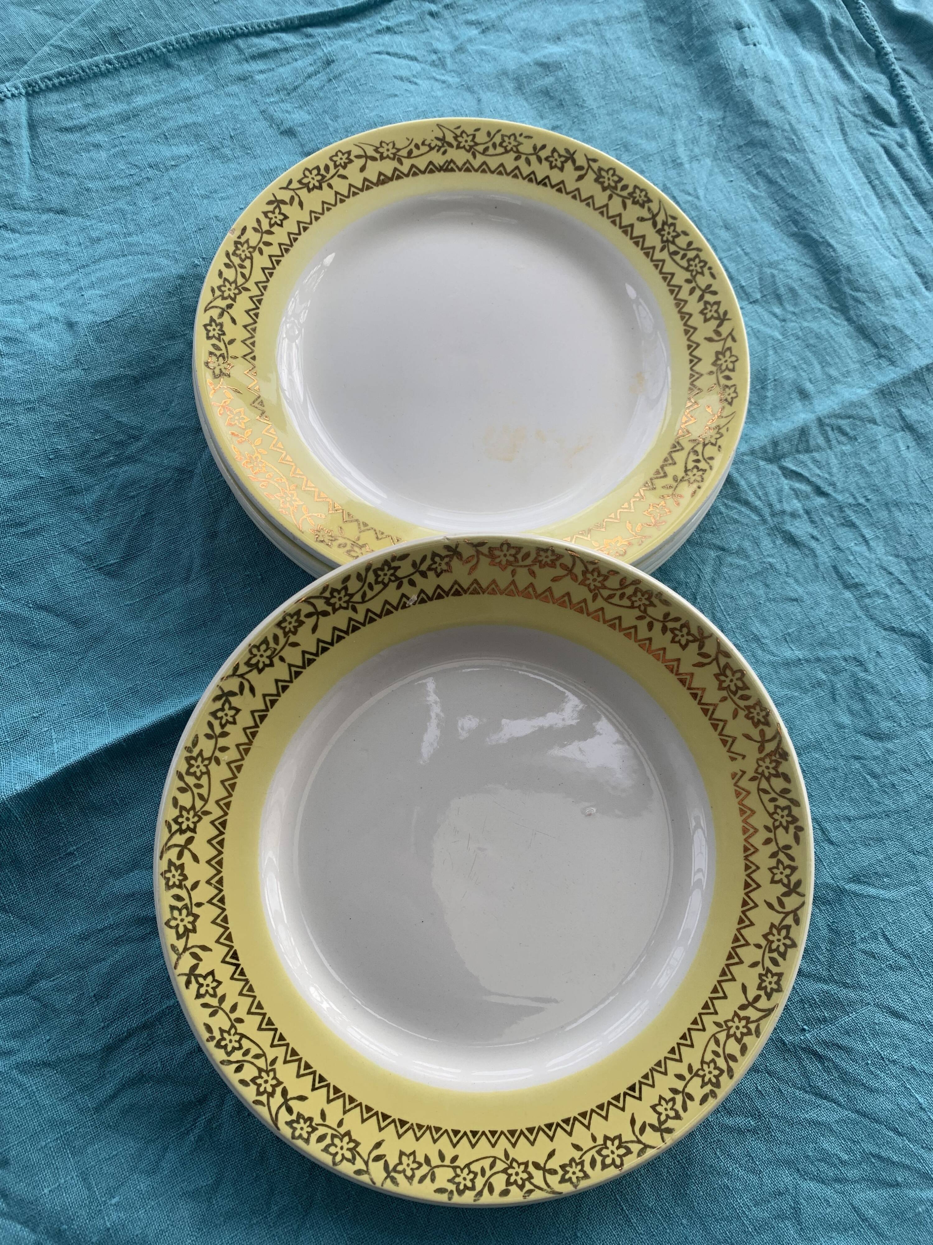 6 small plates with yellow borders and floral pattern gold antiques