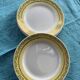 6 small plates with yellow borders and floral pattern gold antiques