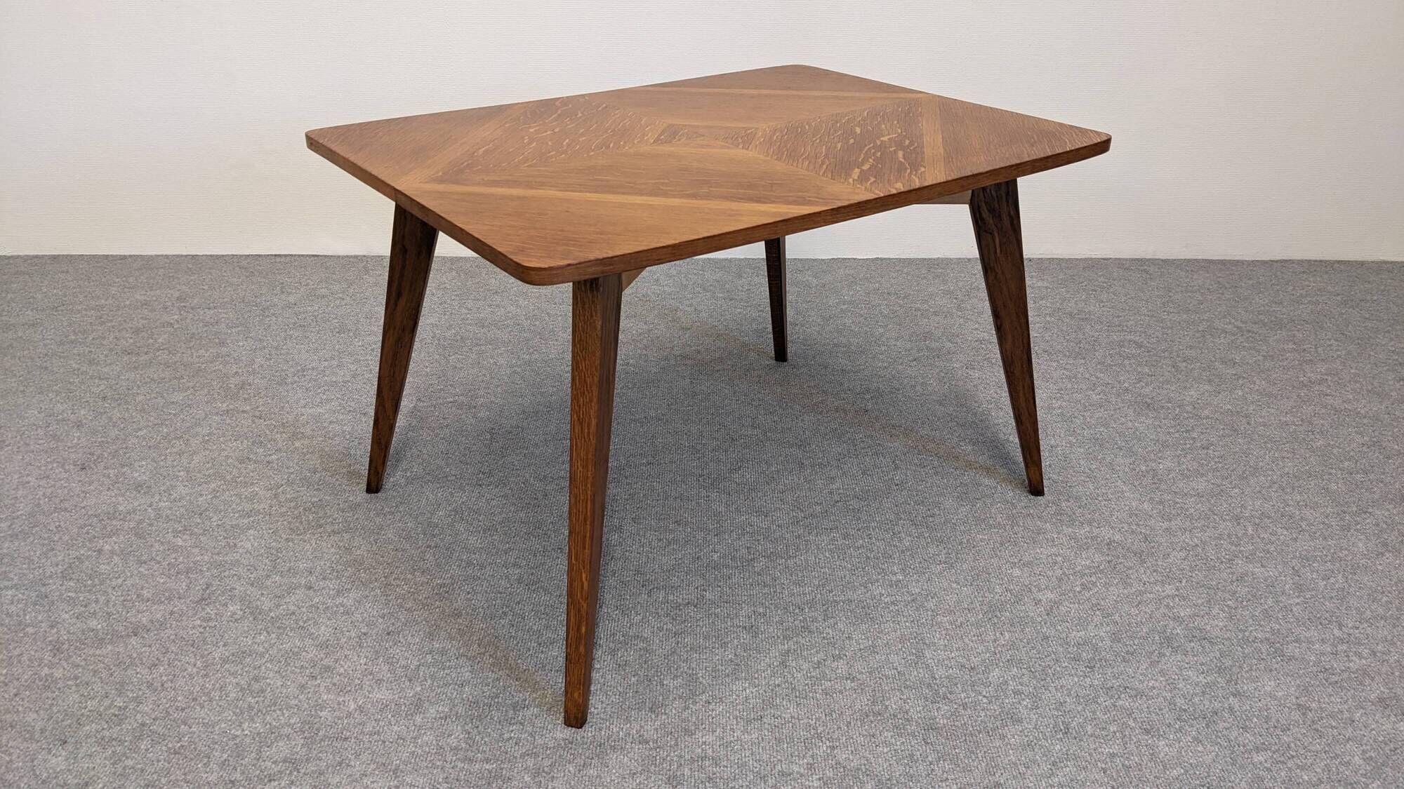 Modernist coffee or side table in oak marquetry, France 1960.