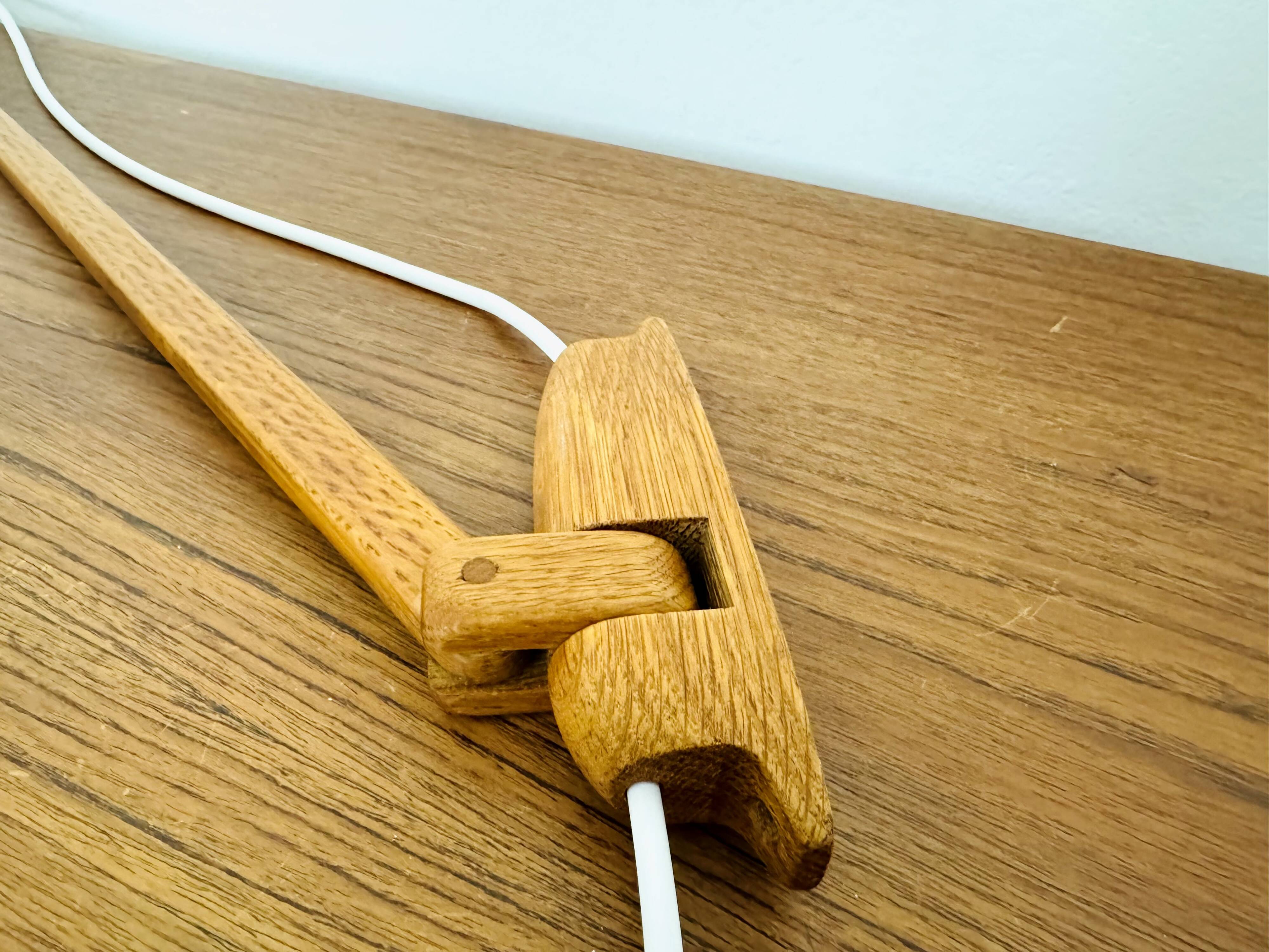 Danish Adjustable Oak Wall Lamp by Uno and Östen Kristiansson
