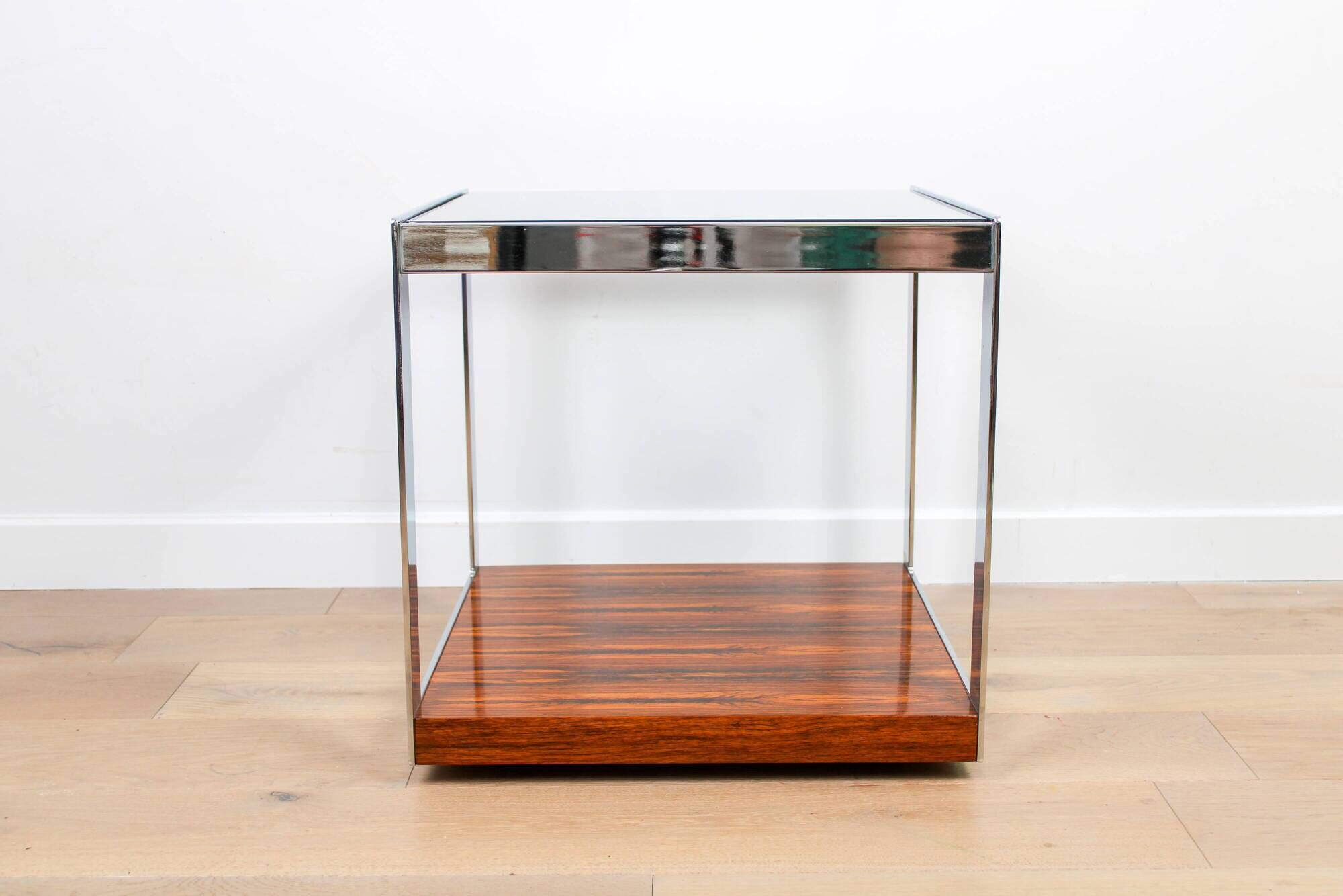 A vintage mid-century glass and rosewood side table by Merrow Associates