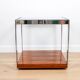 A vintage mid-century glass and rosewood side table by Merrow Associates