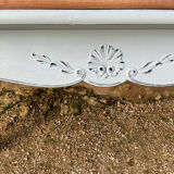 Louis XV style walnut table with a natural wood top.