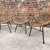Trio de fauteuils coquille vintage en rotin pieds metal, meubles sièges anciens osier
