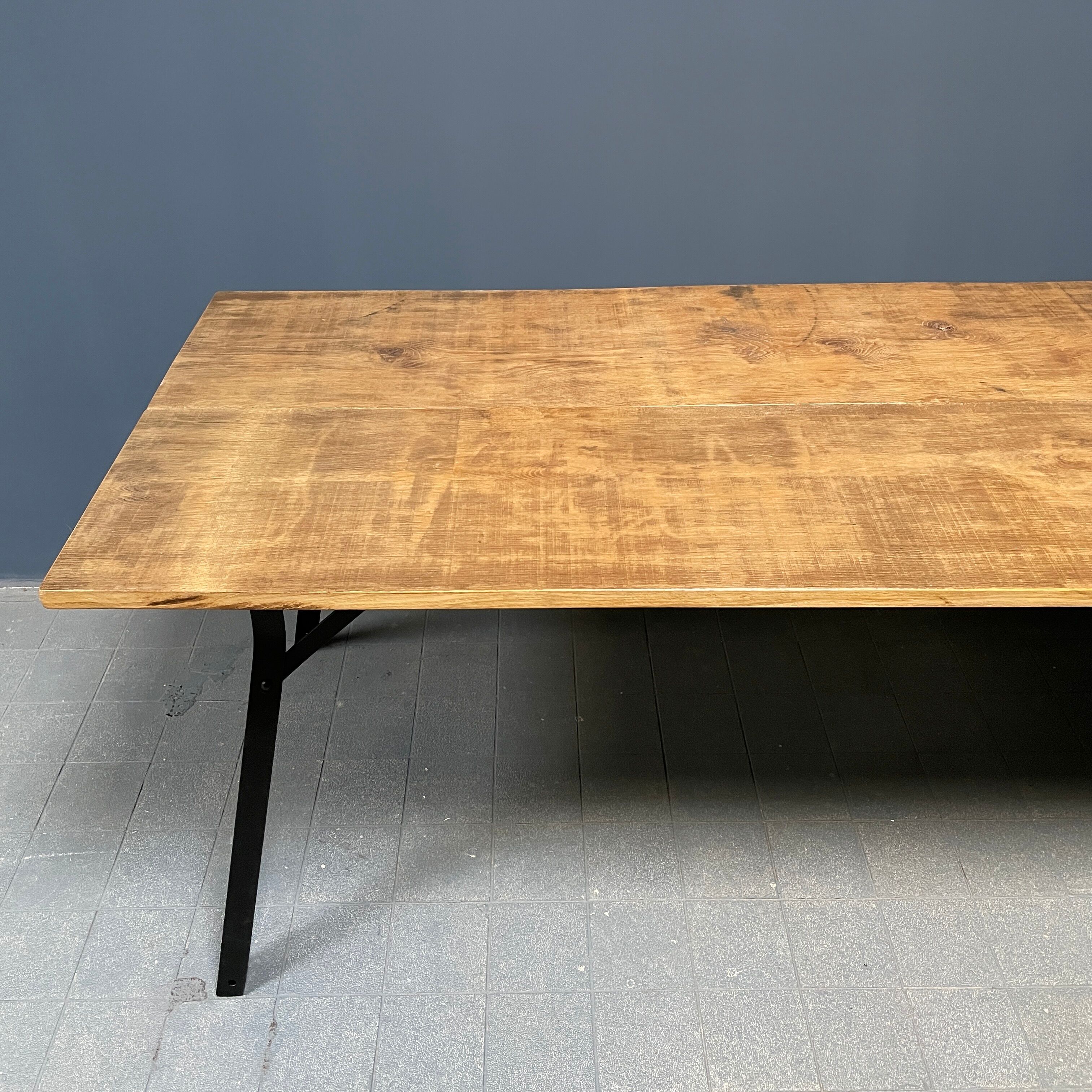 Handmade industrial oak dining table with black metal legs