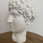 White plaster Greek head