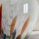 Large blown glass vase with polychrome inclusions in the Murano style.