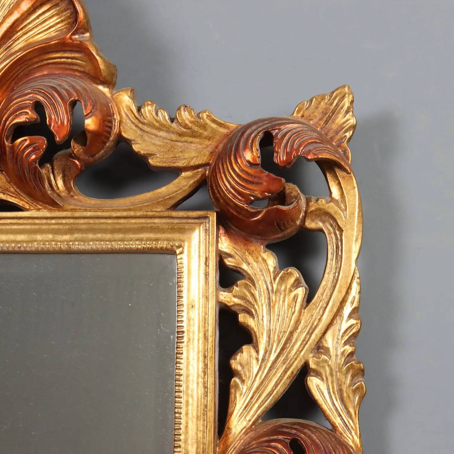Antique baroque style mirror in carved wood, Italy, 20th century.