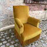 Fauteuil crapaud velours jaune moutarde à franges