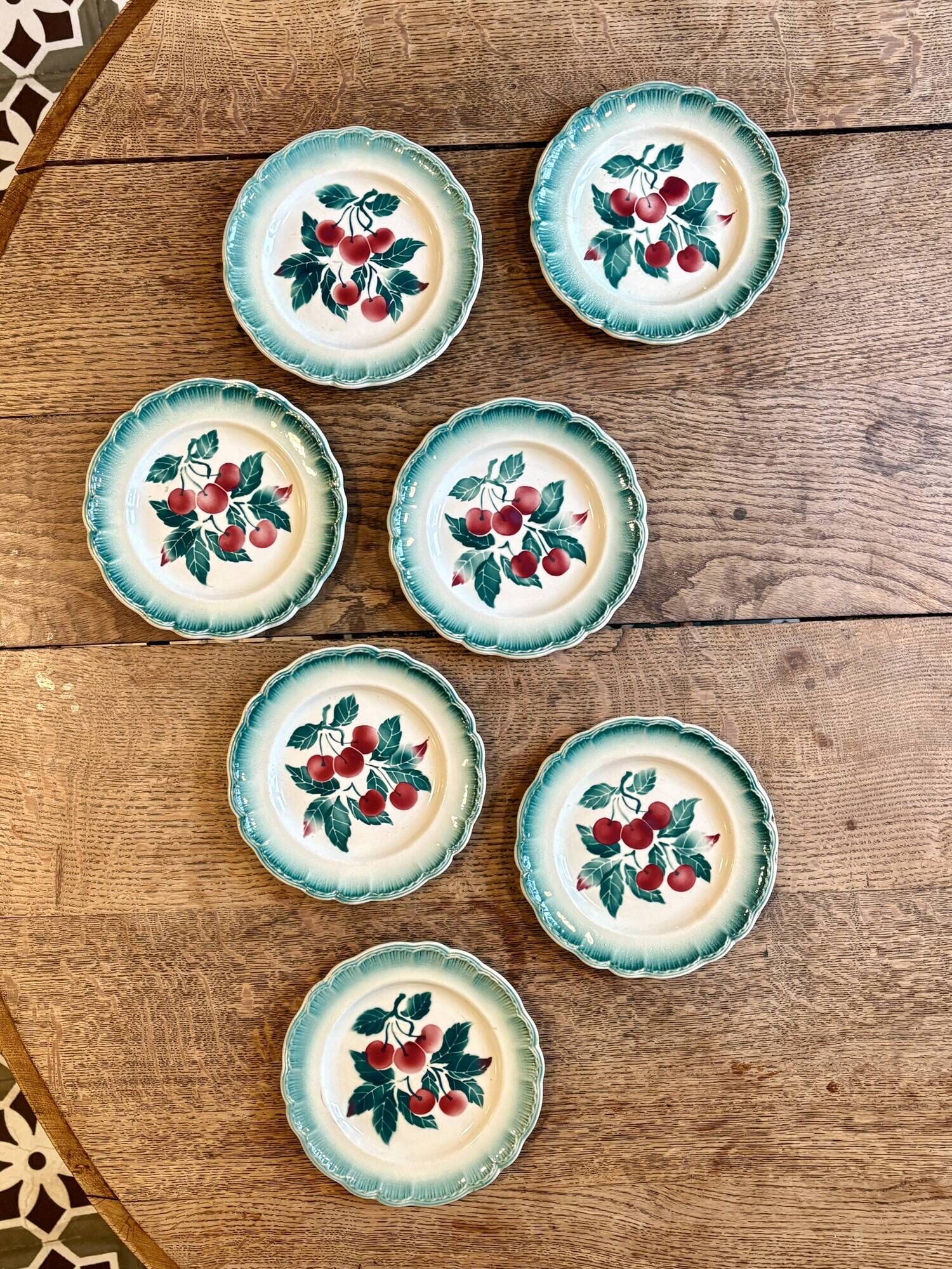 Set of 7 vintage Badonvilier dessert plates.
