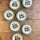 Set of 7 vintage Badonvilier dessert plates.