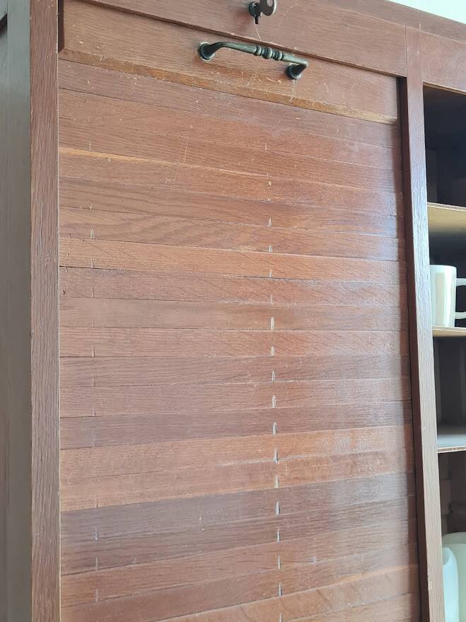 Vintage double curtain filing cabinet.