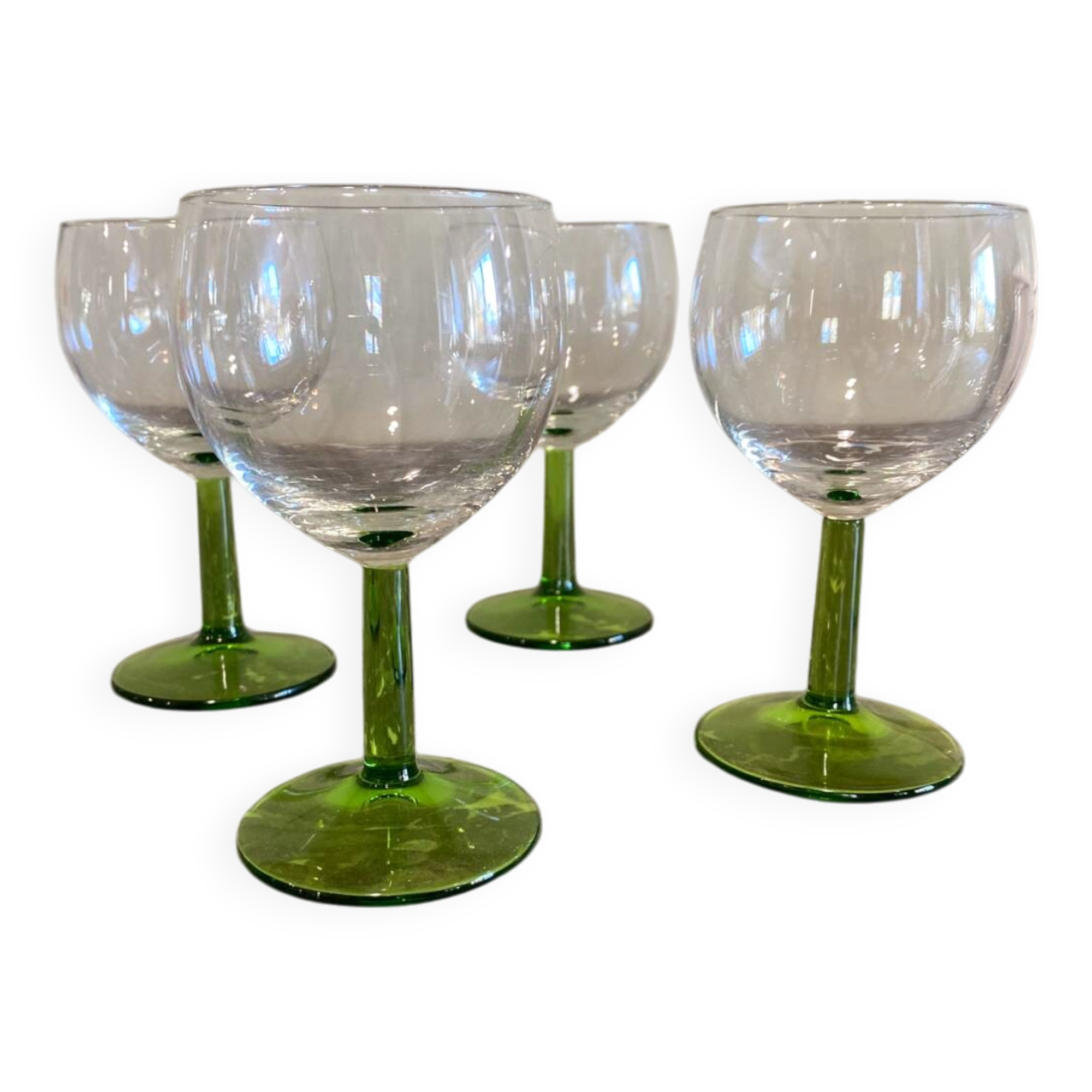 4 green stemmed glasses