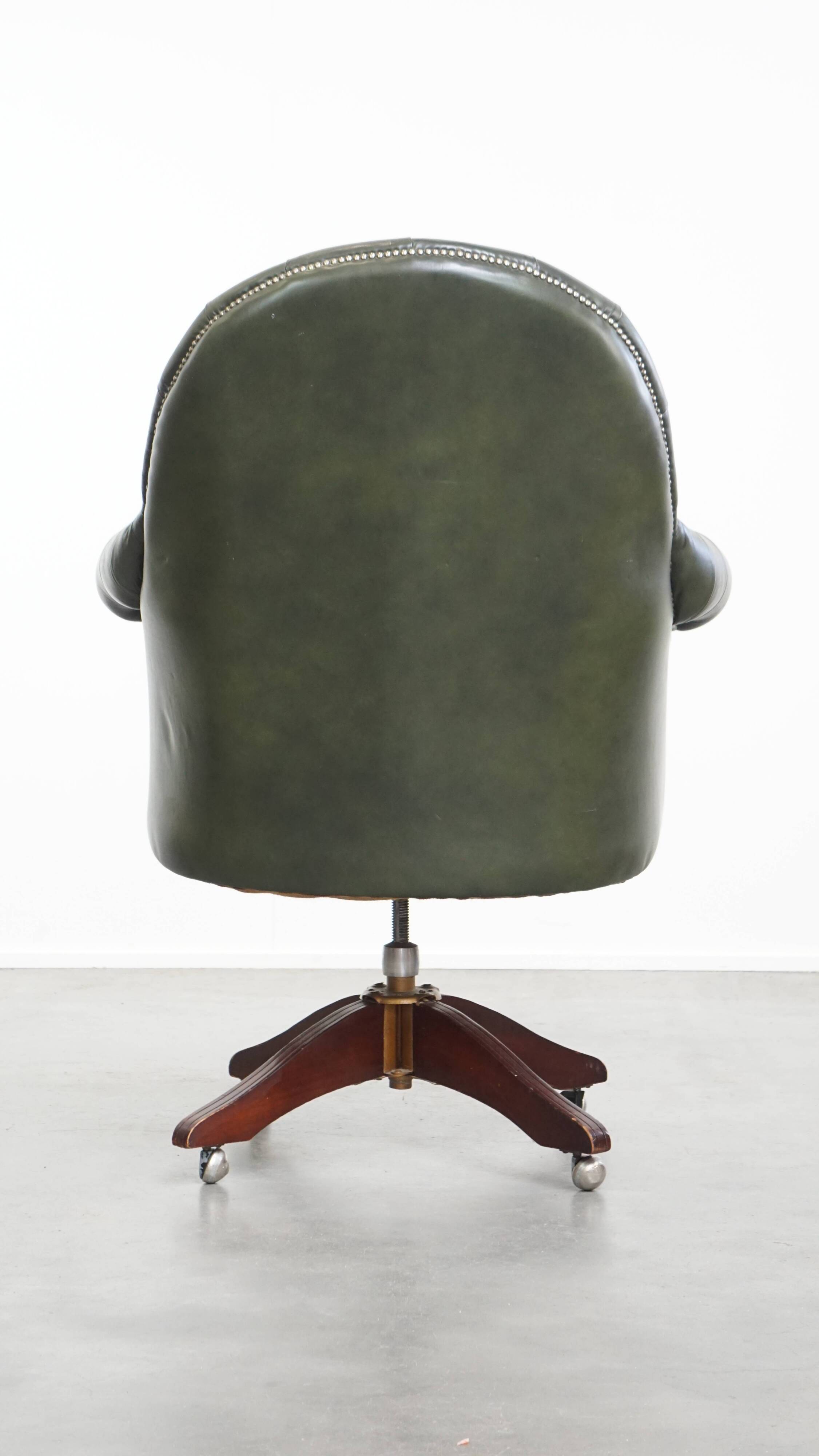 Chesterfield office chair in green cowhide leather on casters with high back