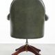 Chesterfield office chair in green cowhide leather on casters with high back